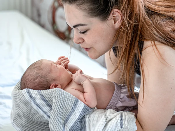 Postpartum Doulas Are Part of the 2026 Baby Trend Report — Here’s What They Do and How to Find One